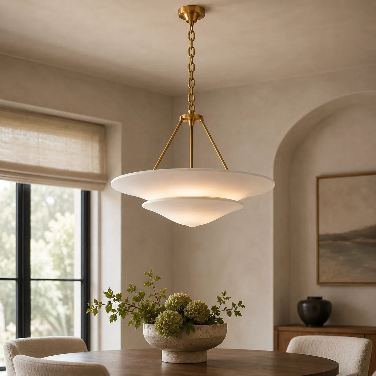 LumiereChic gold chandelier close-up above a dining table