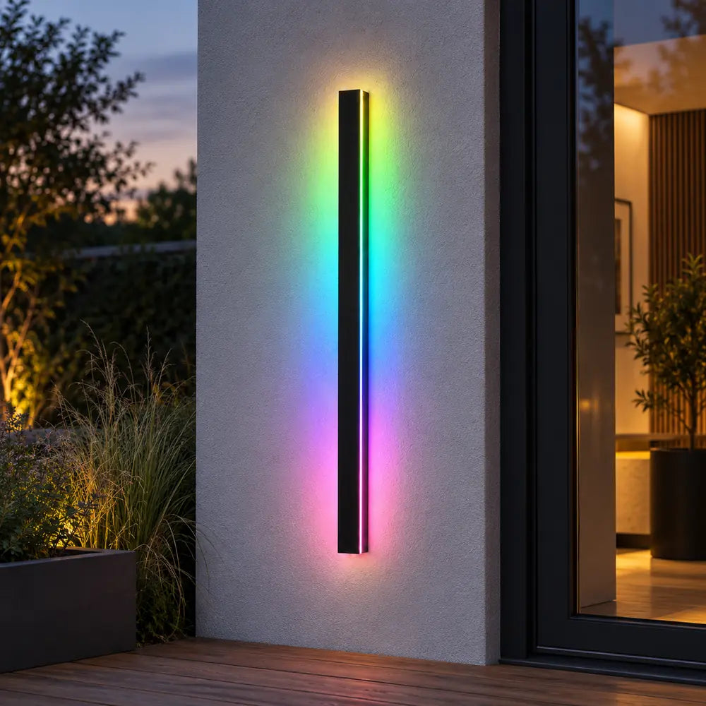 SilexStone black RGB outdoor wall light beside a garden studio