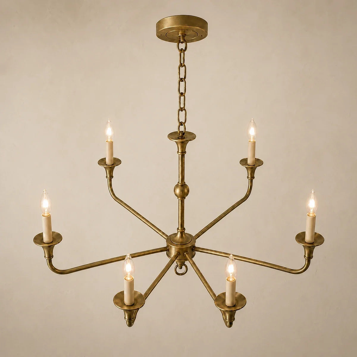 BrassAura six-head chandelier in brass