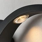 Macro detail of a single LED lens set into the curve of the wave sconce