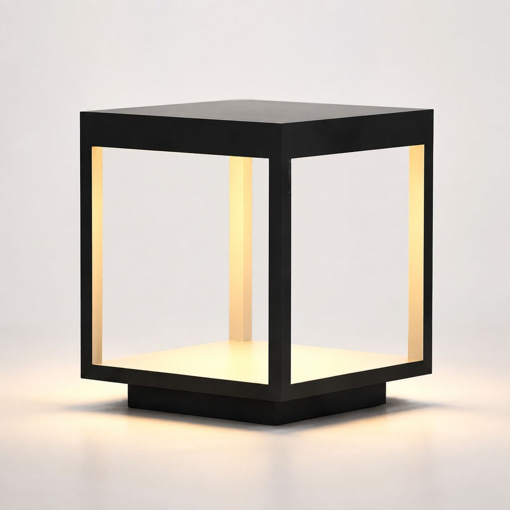 Hardwired cube pillar light in black stainless steel with acrylic diffuser, studio front view
