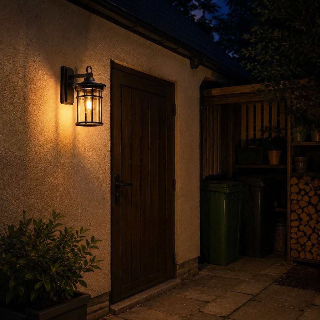 Caged glass wall lantern lighting a timber side door and passage