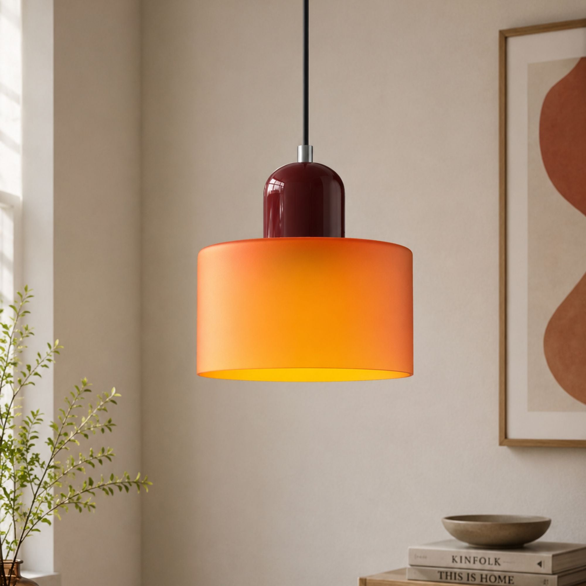 Bauhaus_inspired_orange_glass_pendant_lamp_with_soft_warm_glow_2