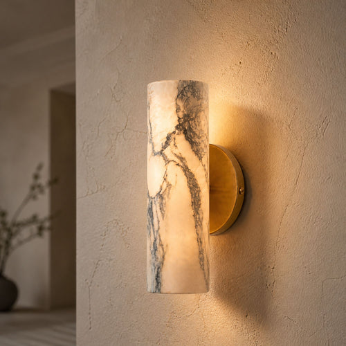 Modern marble wall lamp with brass base for warm ambient lighting