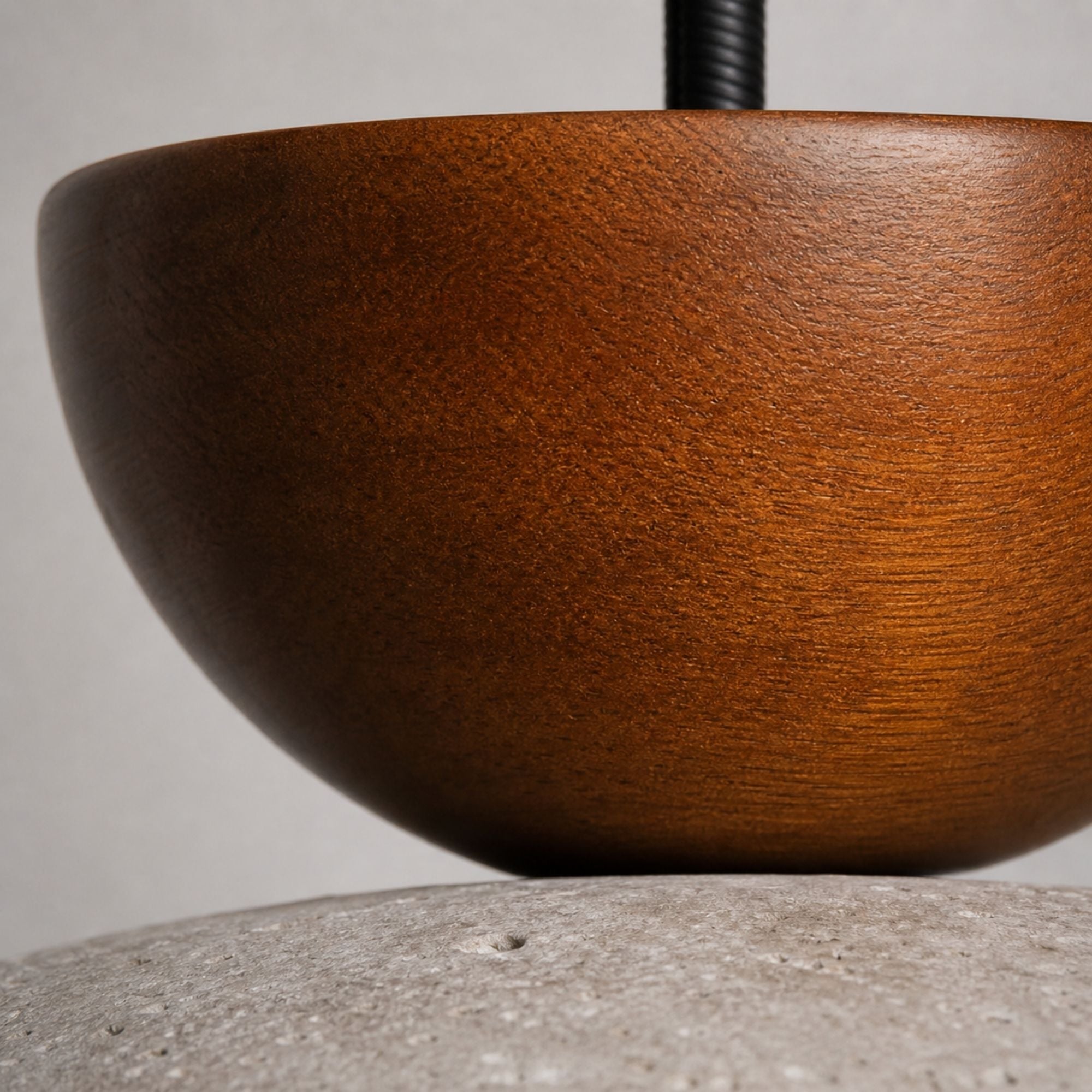 Wood detail of pendant light with natural finish design
