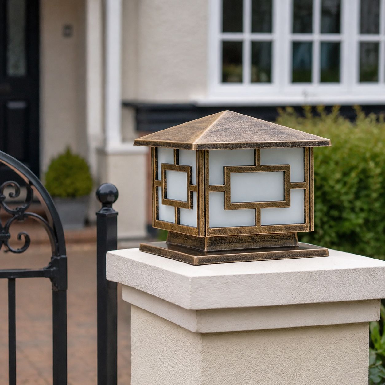 Two pagoda pillar lights on dark brick piers along a cobbled mews street