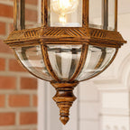 Close-up of the banded cap, domed glass and turned finial