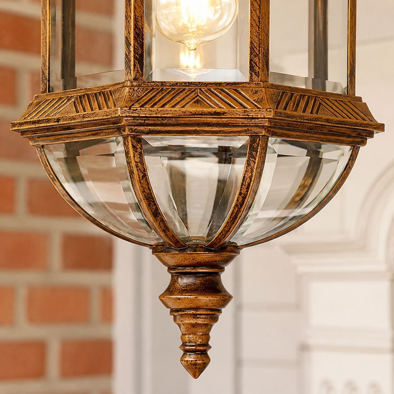 Close-up of the banded cap, domed glass and turned finial