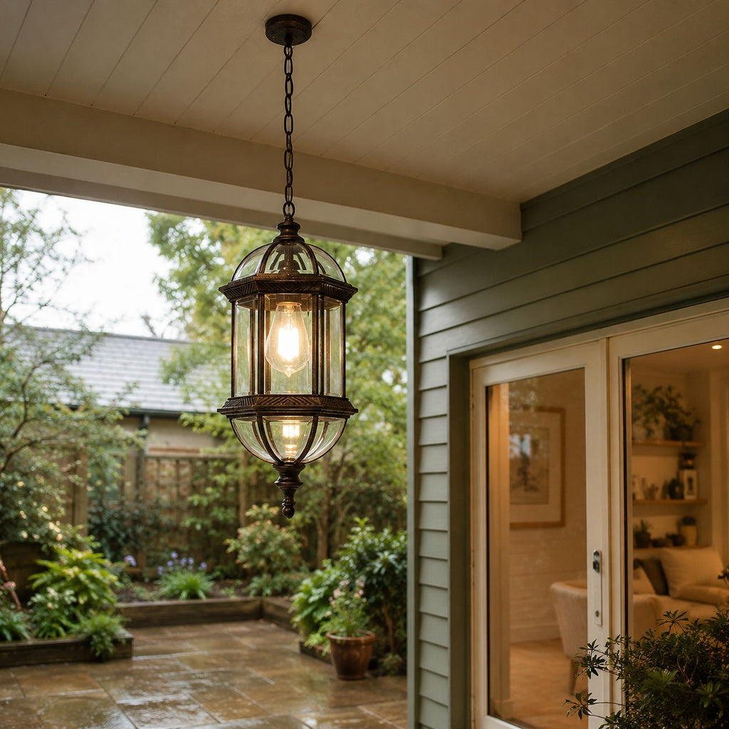 Domed pendant lantern hanging from a timber ceiling in a courtyard