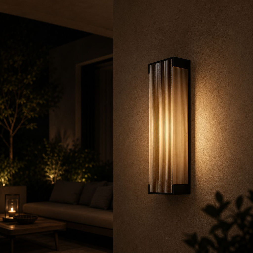 Fluted wall light beside a covered terrace with outdoor seating
