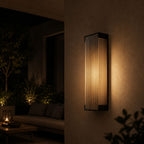 Fluted wall light beside a covered terrace with outdoor seating