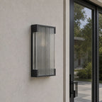 Angled view of the slim black frame and fluted panel on pale render