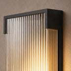Close-up of the vertical fluted rods lit from within