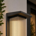Angled close-up of the flat cap and full-height reeded panel