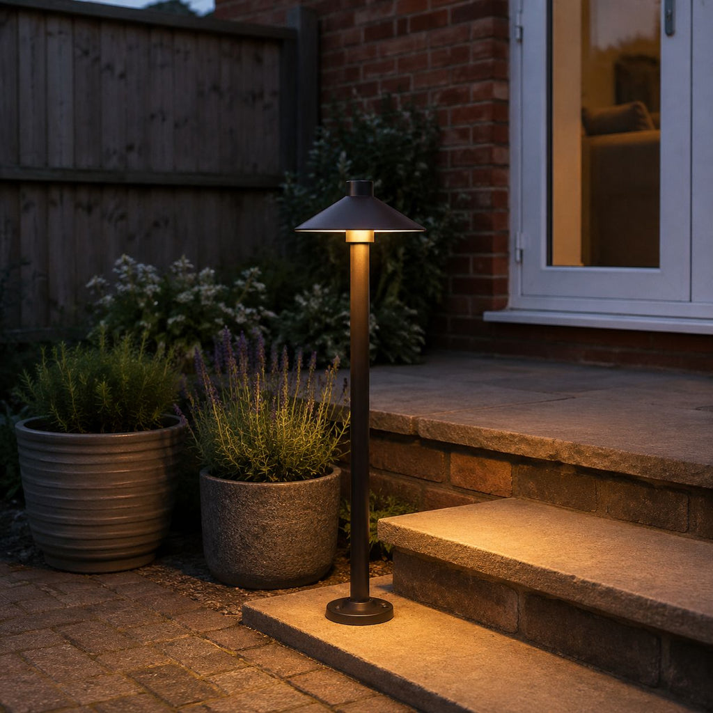 Umbrella path light beside stone steps and lavender planters