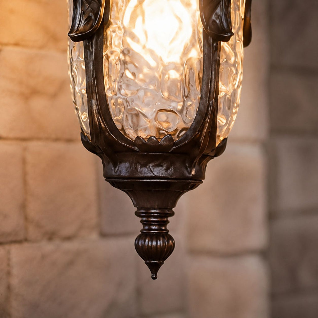 Macro of the rippled hammered glass and turned finial