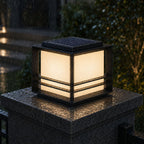 Solar pillar light in heavy rain, water beading on the panel set into the top