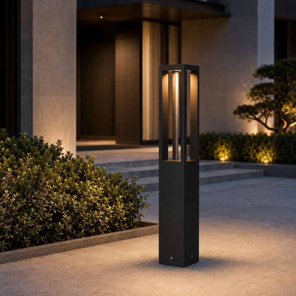 Tallest 79cm bollard light beside the steps of a modern lit entrance