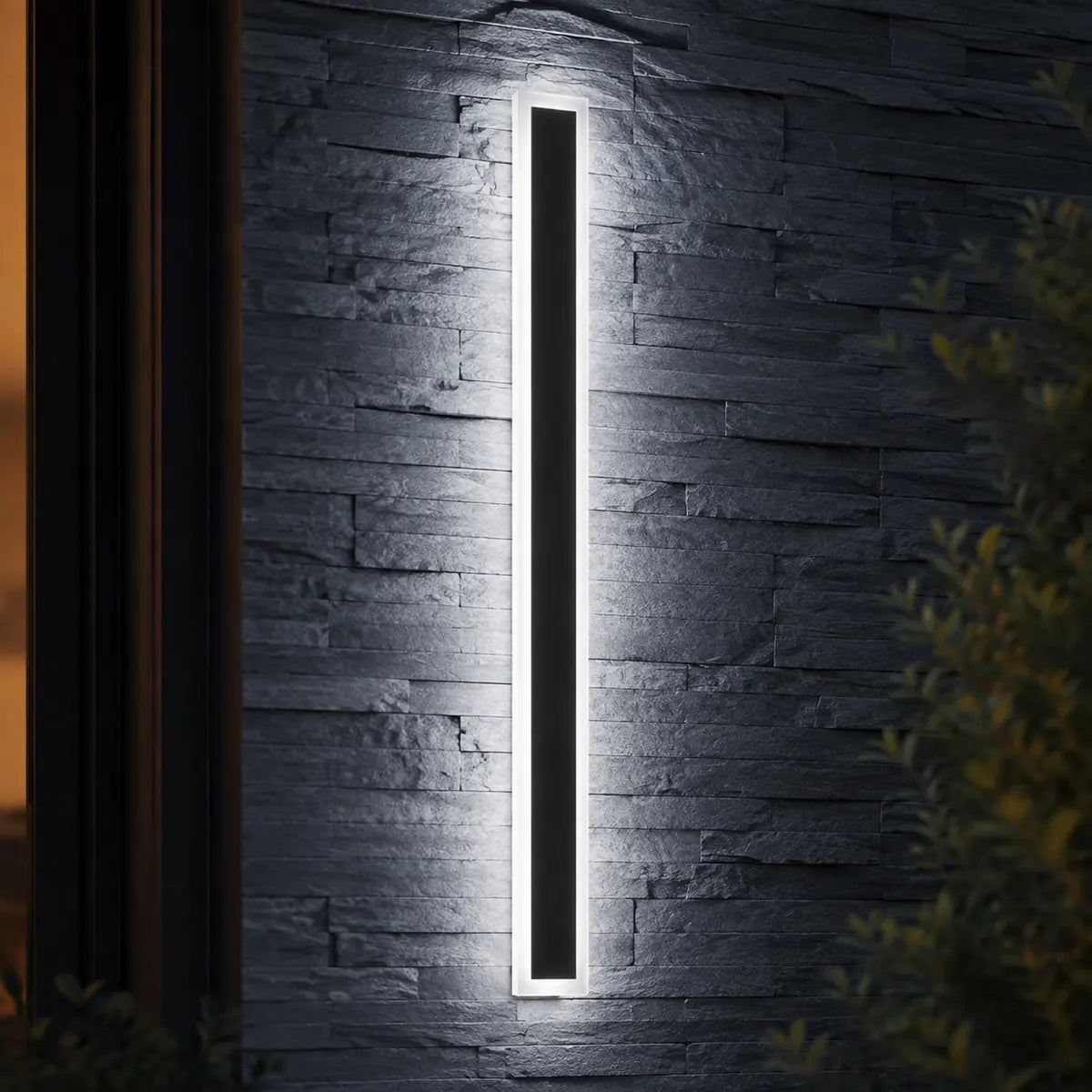 AquaLuxe cool white steady wall light on a slate wall