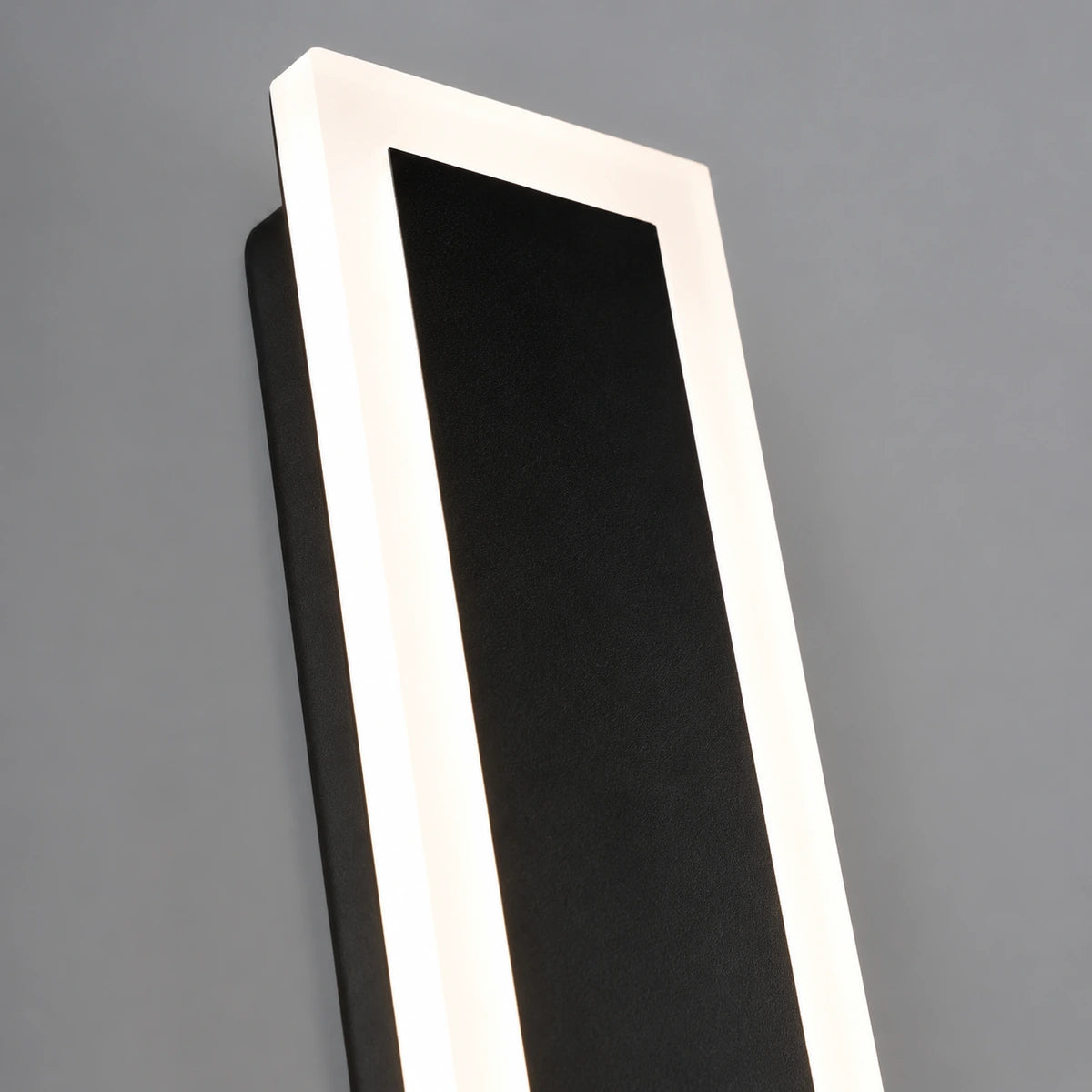 Close-up of the AquaLuxe black frame and warm white acrylic diffuser