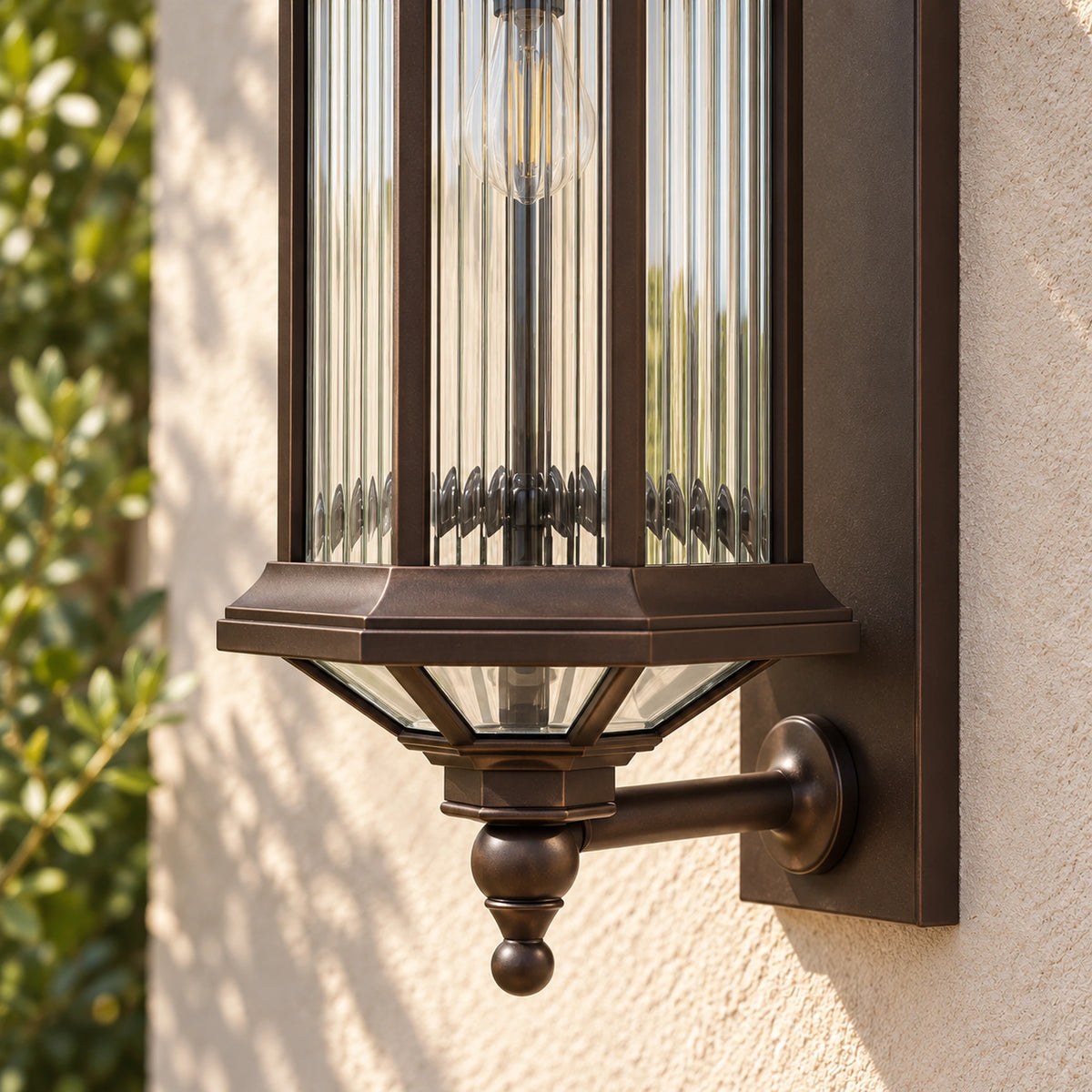 Close-up of the BronzeGlow textured glass, lower frame, glazed base and bottom finial.