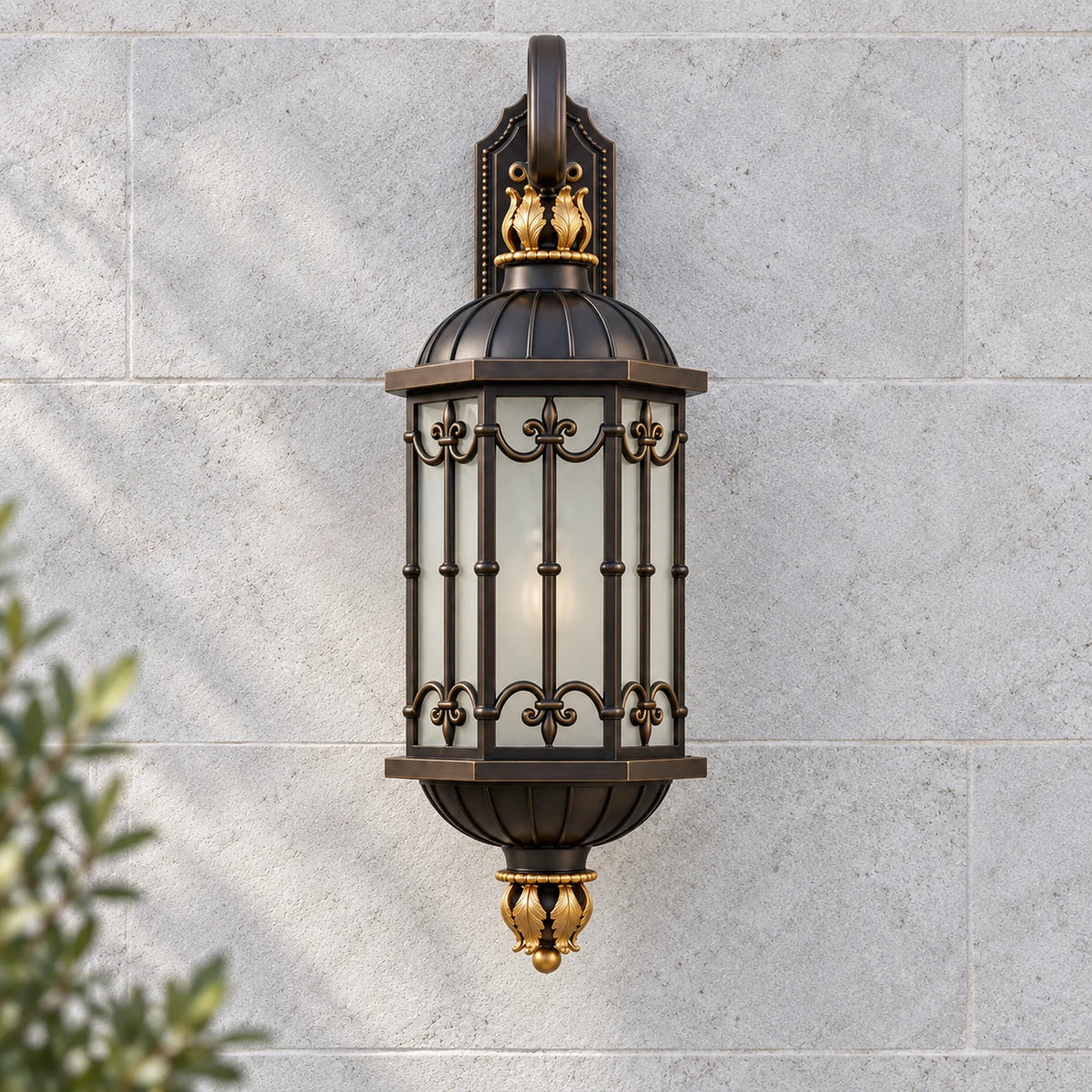 Front view of the BronzeMist bronze lantern showing diffused glass, decorative metalwork and top and bottom ornaments.