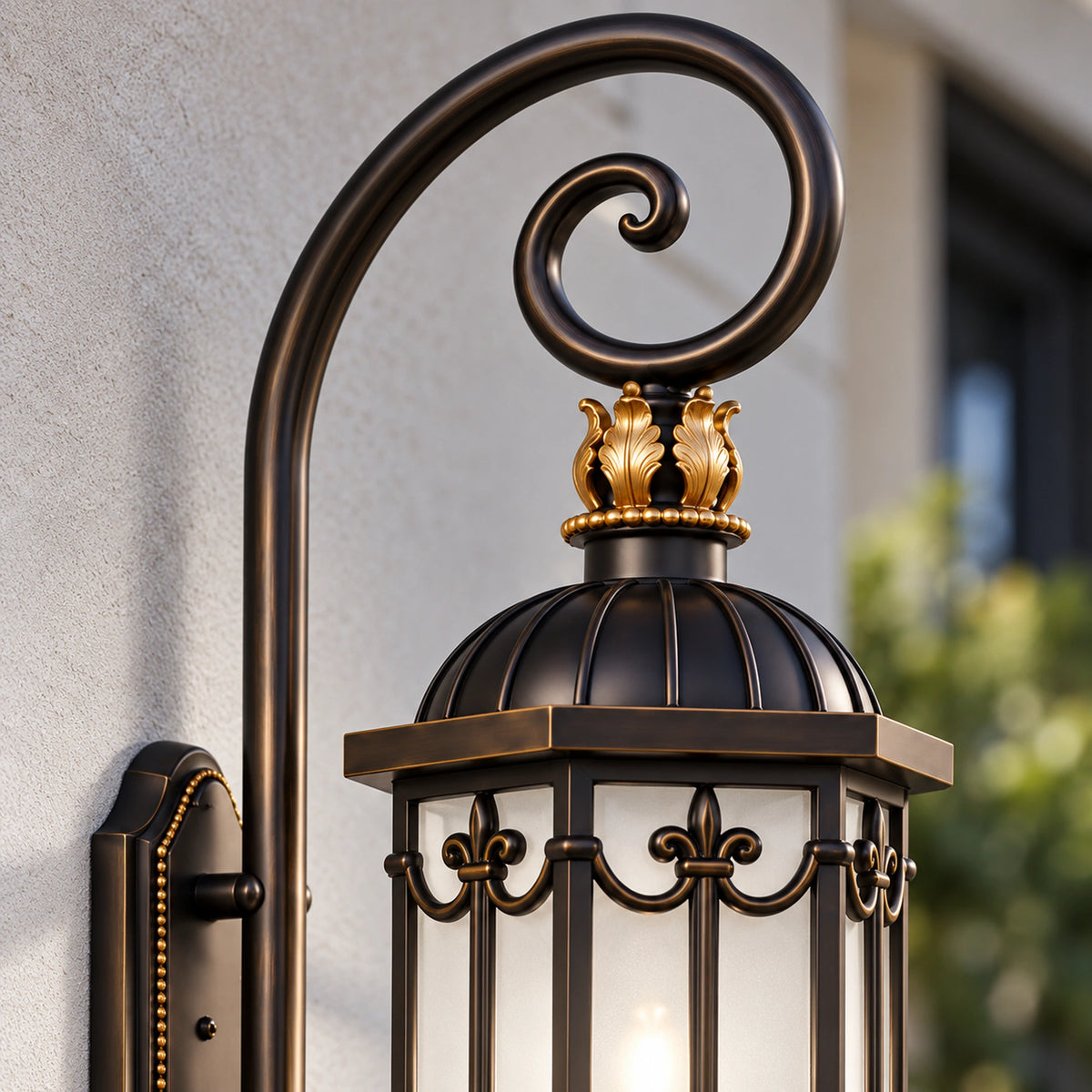 Close-up of the BronzeMist scroll arm, leaf-shaped crown ornament, ribbed roof and upper frame.