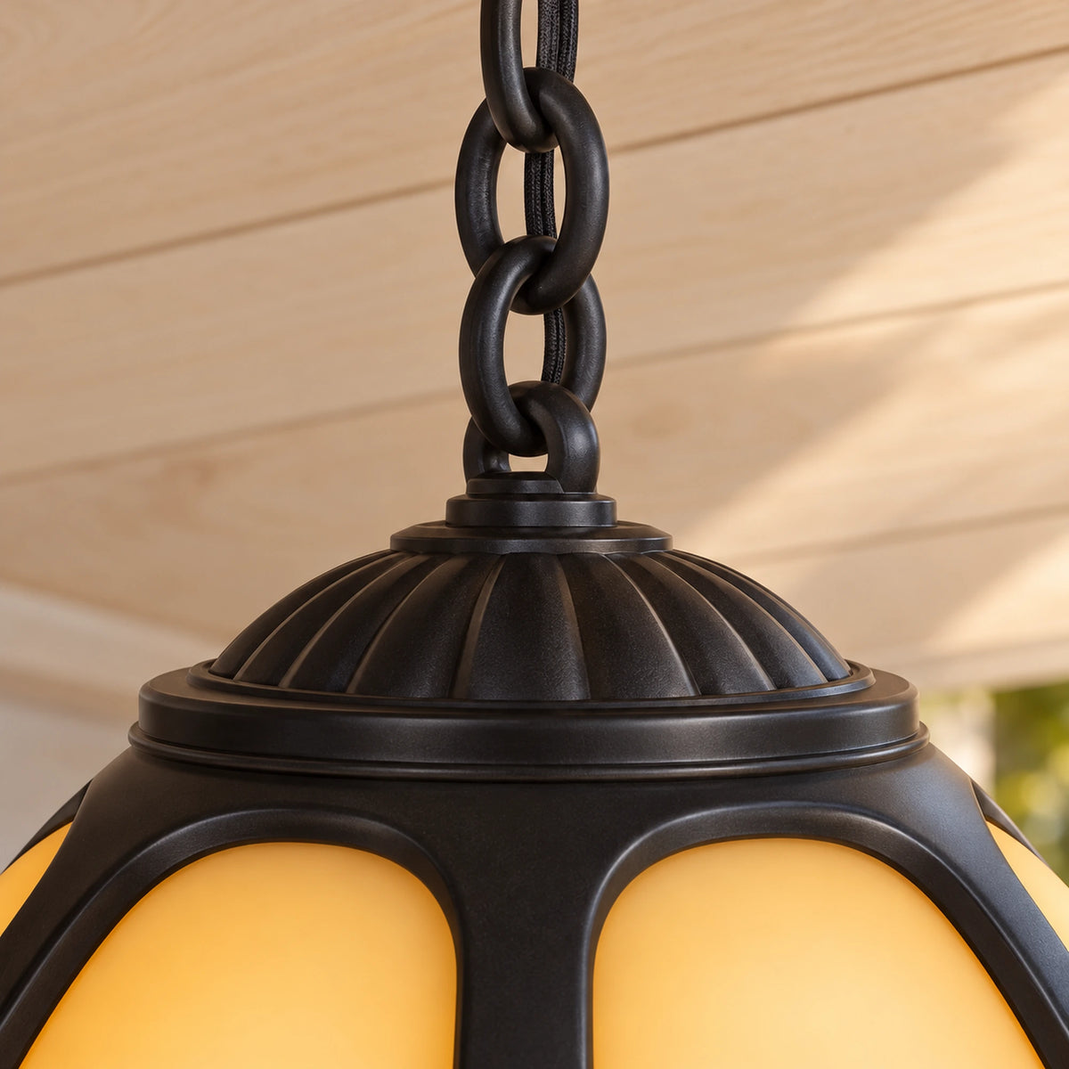 Close-up of Petalora’s interlinked chain, attachment ring and fluted black top cap.