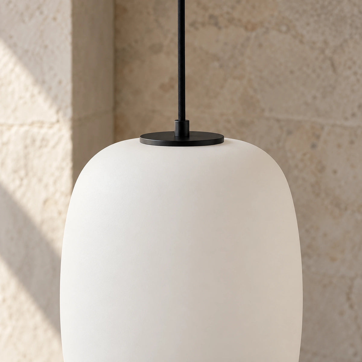 Close-up of Shizora’s smooth opal shade and black top connection.
