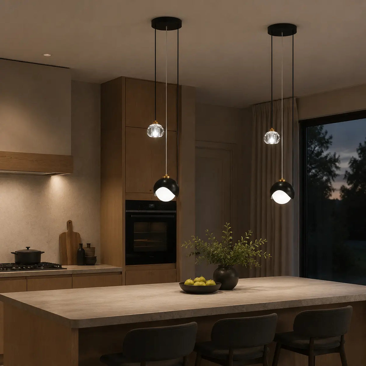 Two Luminara black glass pendant lights above a modern kitchen island