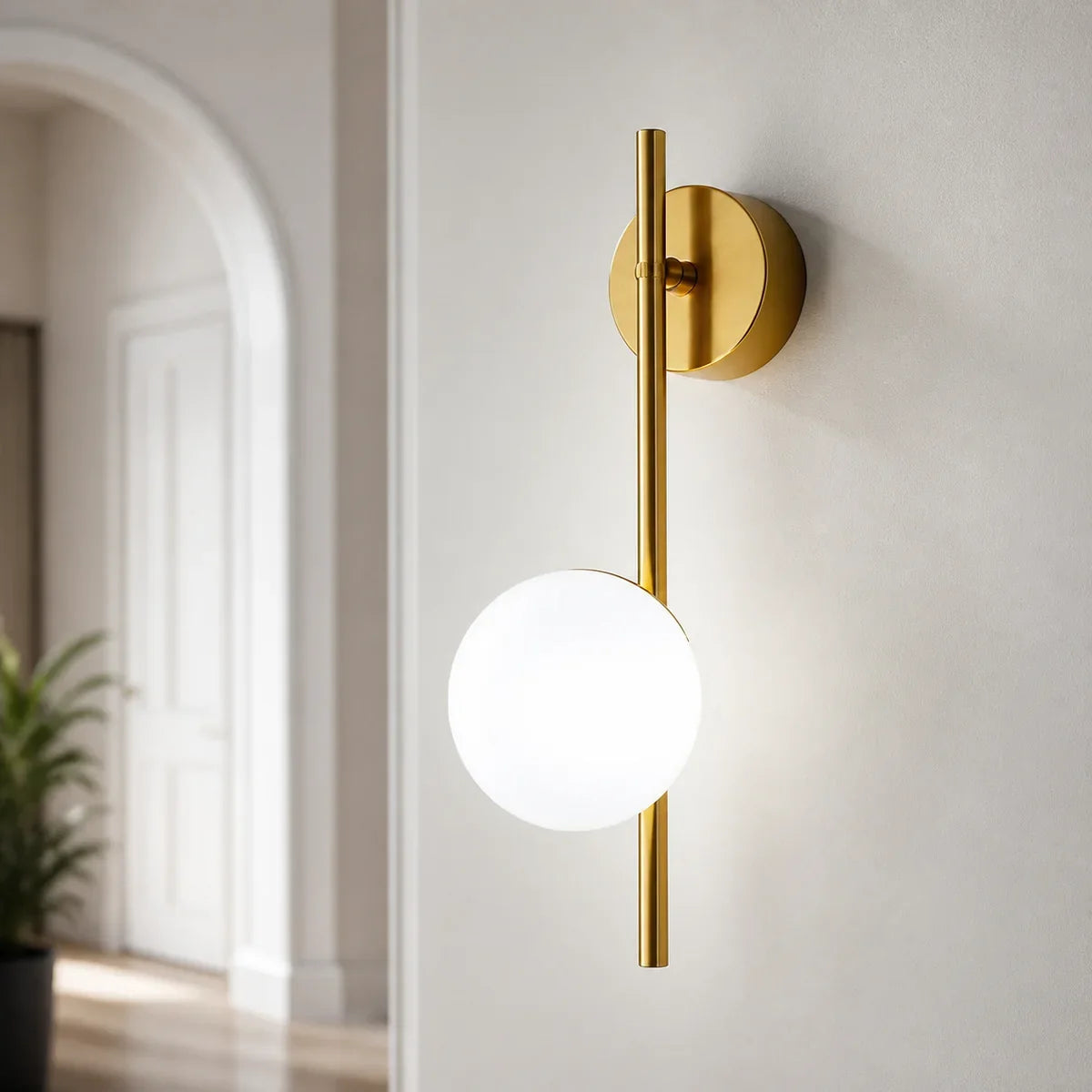 NordicGlow gold wall sconce with cool white frosted globe